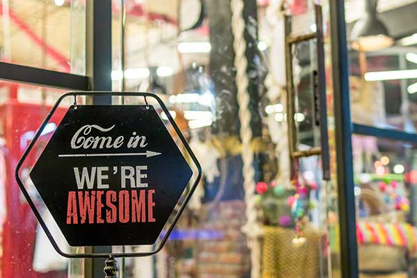 "Come in we're awesome" sign