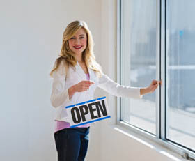 Woman with Open Sign